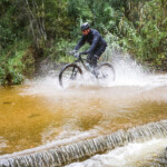 Flooded rivers, swollen by 48 hours of rain, made the final 83km leg, from Calitzdorp to Oudtshoorn, exceptionally muddy and wet. Photo by Oakpics.com.