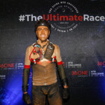 A muddy Warren Langridge posing for a winner’s photo after his Half success. Photo by Oakpics.com.