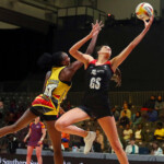 Falidah Kadondi and Georgia Rowe: Falidah Kadondi of Uganda and Georgia Rowe of Wales during the Netball World Cup 2023, Pool G match between Wales and Uganda at Cape Town International Convention Centre, Court 1 on August 02, 2023 in Cape Town, South Africa. (Photo by Shaun Roy/Gallo Images/Netball World Cup 2023)